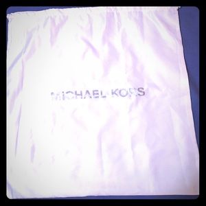 Two Michael Kors purse duster bags. 1 Lrg 1 Small